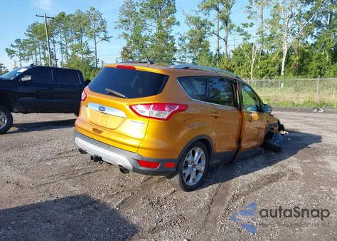 2016 Ford Escape Titanium z USA, uszkodzony, nr VIN 1FMCU0J97GUB31326